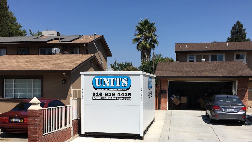 image of units portable storage in vacaville container placed between two homes