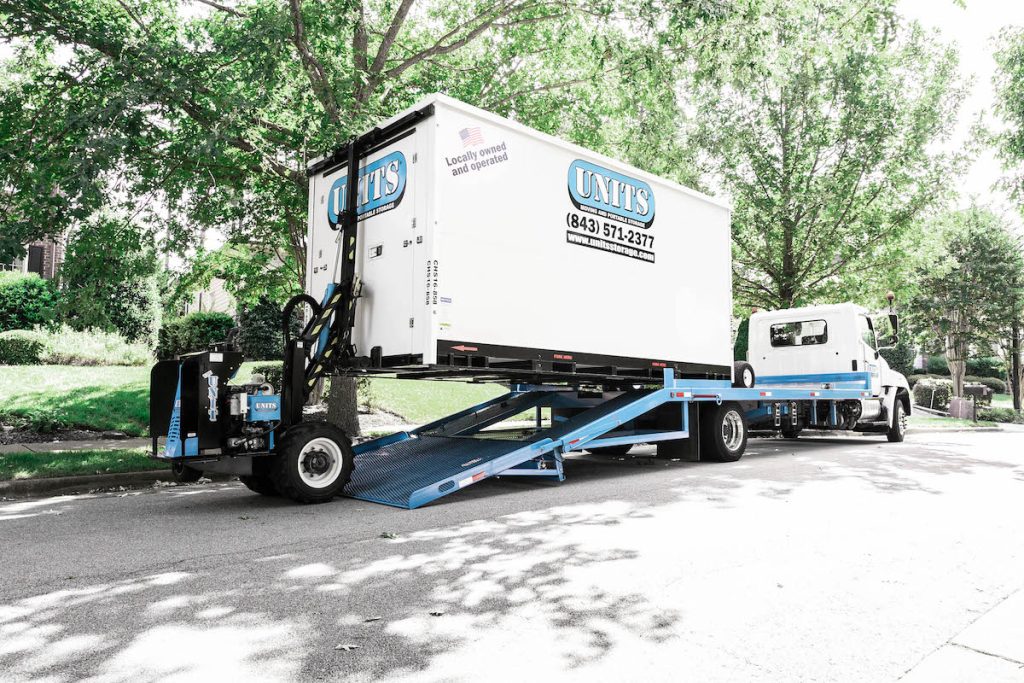 image of units portable storage in dixon container being unloaded from the delivery truck